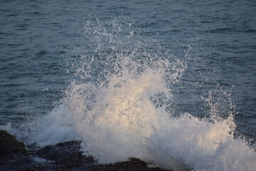 waves crashing on the rocks