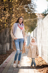 Fototapeta premium Mother with little daughter having fun together 