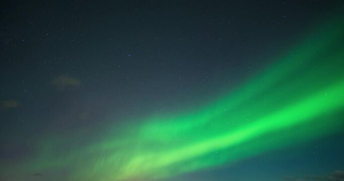 Aurora Borealis, Northern Lights with stars in the night sky on Arctic Circle at North Pole