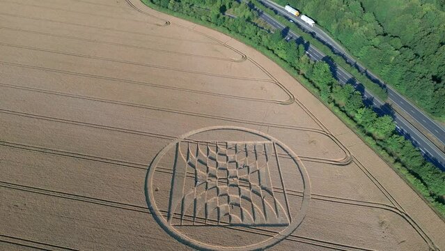 Crop Circle In Wheat Field Near Micheldever Station In England - aerial drone shot