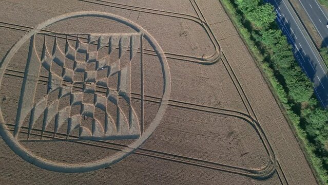 Crop Circle In Wheat Field Near Micheldever Station In Hampshire, UK. aerial