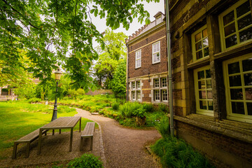 Exterior view of the Natural History Museum in Maastricht, the Netherlands, and the surrounding garden from the early 20th century