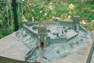 The sculpture is a castle in miniature. The metal sculpture shows how Lubart's Lutsk Castle looked like in the Middle Ages. Miniature castle.