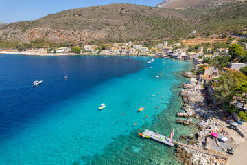 Aerial panoramic photo of Limeni the picturesque  villlage with the turquoise waters and the stone...
