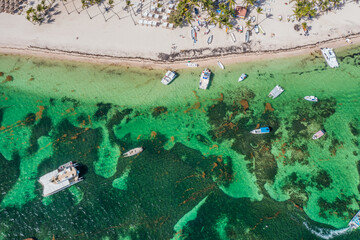 gorgeous Vacation destination - top view azure water with boats anchored in shallow water near...