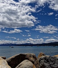 Vertical shot of a Lake Tahoe with sailing boats on a summer day
