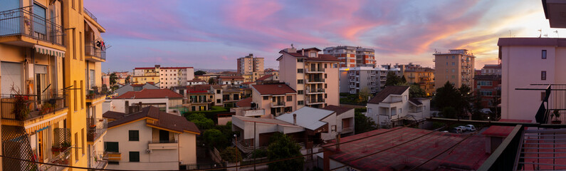 panoramica city skyline with clouds of Aversa at sunset