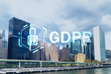 New York City skyline, United Nation headquarters over the East River, Manhattan, Midtown at day time, NYC, USA. GDPR hologram, concept of data protection, regulation and privacy for all individuals