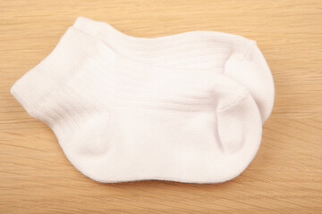 image of socks wooden desk background