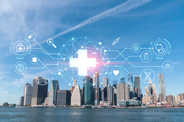 Skyline of New York City Financial Downtown Skyscrapers over East River from park, Dumbo at day time, Manhattan. Health care digital medicine hologram. The concept of treatment and disease prevention