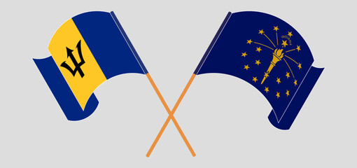 Crossed and waving flags of Barbados and the State of Indiana