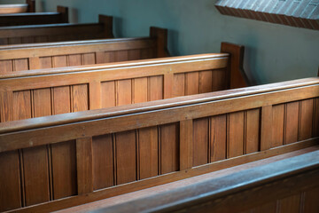 Wooden pews in an old Dutch church.