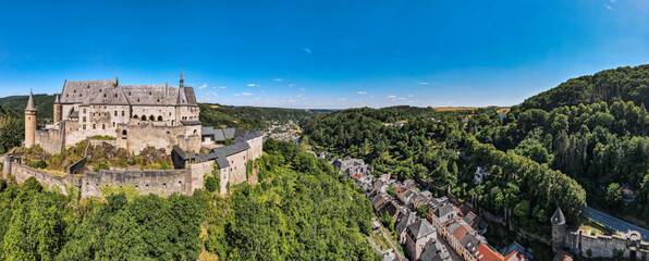 Aerial panoramic landscape view of the stunning beautiful Vianden castle in norther Luxembourg, ...