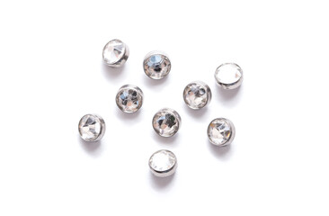 A set of jewelry for piercing on a white background. A set of earrings for the body, nose, navel, tongue, nipples, ears, various beauty jewelry, a set of cosmetological jewelry for piercing.