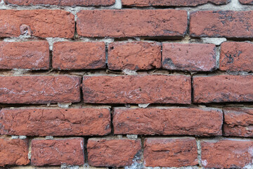 Obraz premium background of red bricks isolated.there is a place for the inscription wall with red bricks