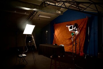 Empty interview set with exposed lights ready for recording