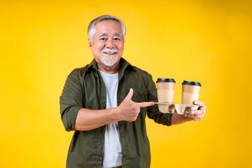 senior old man hold paper cup of coffee.