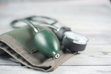 detail shot of blood pressure machine on table 