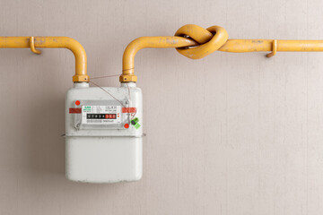 Household gas meter with a pipeline on the wall twisted into a knot. 3D render