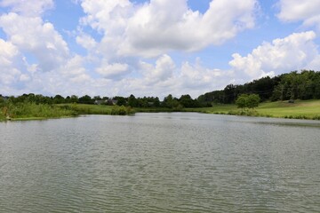 The beautiful lake in the countryside on a sunny day.