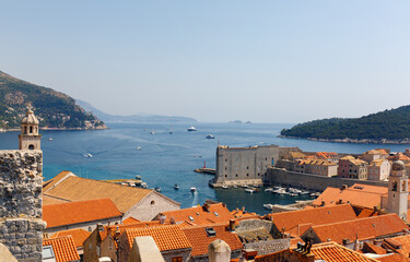Port of Dubrovnik from the old city walls in a sunny day