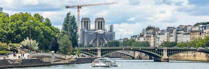 Notre-Dame de Paris under reconstruction after the fire of 2019 - obrazy, fototapety, plakaty