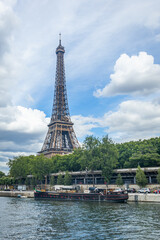 Fototapeta na wymiar Eiffel Tower seen from a boat cruising on the Seine river in Paris, France