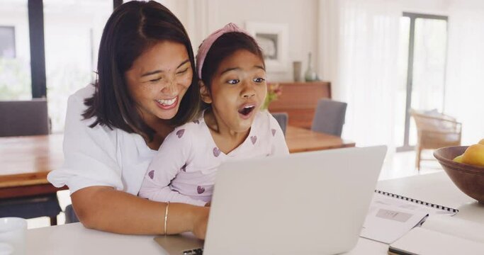 Parent, laptop and high five with child at desk while learning or playing game together. Support from proud mother bonding with daughter. Kid feeling cheerful winning a game or successful grade.