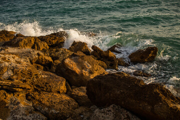 Fototapeta na wymiar Le Castella, Calabria, Italy, waves and rocks