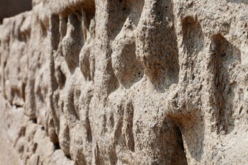 Bas relief rock cut sculptures of gods, people and animals are carved prominently in the monolithic cave temples at Mahabalipuram, Tamil nadu, India