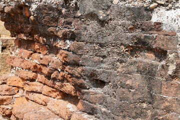 Ruins of ancient abandoned structure of 7th Century A.D. Historical destroyed built structure of ancient heritage landmark site in Mahabalipuram, Tamilnadu, India.