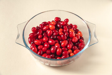 Fresh cranberries in a glass bowl. Healthy eating concept