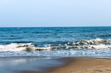 Waves on the beach. Beach waves and sand during a summer time in Mahabalipuram