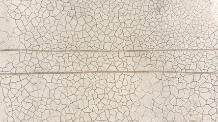 wheel mark on dry cracked ground