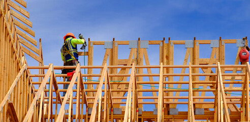 Construction on New Home or Residential Building Wooden Beams and Sky