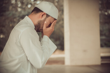 Asian islam man prayer,Young Muslim praying,Ramadan festival concept