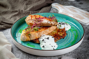 Fried rabbit leg. Served with mousse Three cheese, crusty bread with herbs, zucchini