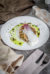 Volga pikeperch with yellow millet risotto. Fried pikeperch, millet, Parmesan cheese, mushrooms, wine, cheese and cream sauce