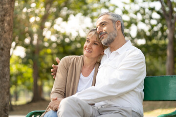 Portrait of happy elderly couple hug together, take care and love with good relationship, good...
