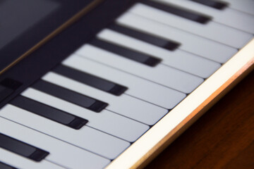 Tablet with piano keyboard on screen. Virtual musical instrument, touchscreen. Piano lessons....