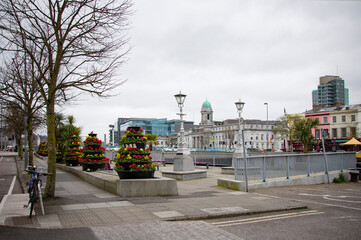 CORK, IRELAND. APRIL 04, 2022. View to the city hall from the embankment. Old city center.