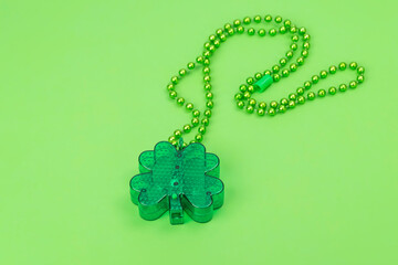 Green shamrocks necklace preparing for St Patrick day