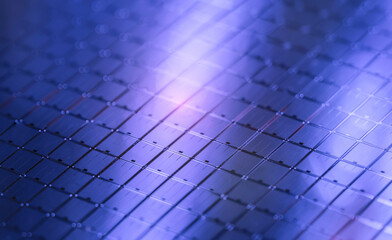 silicon chip wafer reflecting blue colors background