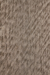 texture of sand, natural sand pattern on the beach. Sand surface with pattern, sand texture background