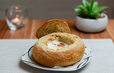 Garlic Cream Soup Served In a Loaf