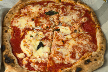 Typical of Italy. Margarita pizza on a rustic cloth