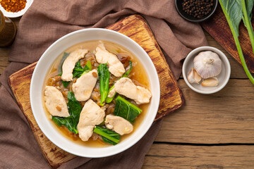 Thai Chicken and Gravy Noodles,Flat rice noodles with chicken breast and vegetables in thick Thai gravy sauce (Rad-Na gai)