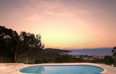 swimming pool at sunset