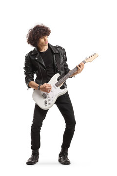 Full length shot of a man in a leather jacket playing an electric guitar
