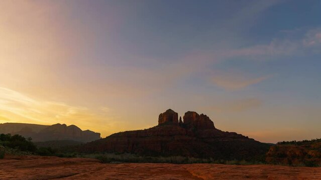 Time lapse of sunrise sky over Cathedral Rock in Sedona, Arizona, USA